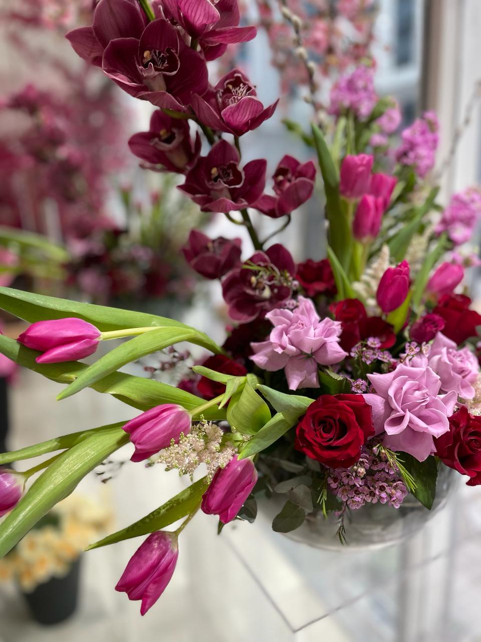 Mixed Maroon Flowers in a Fishbowl