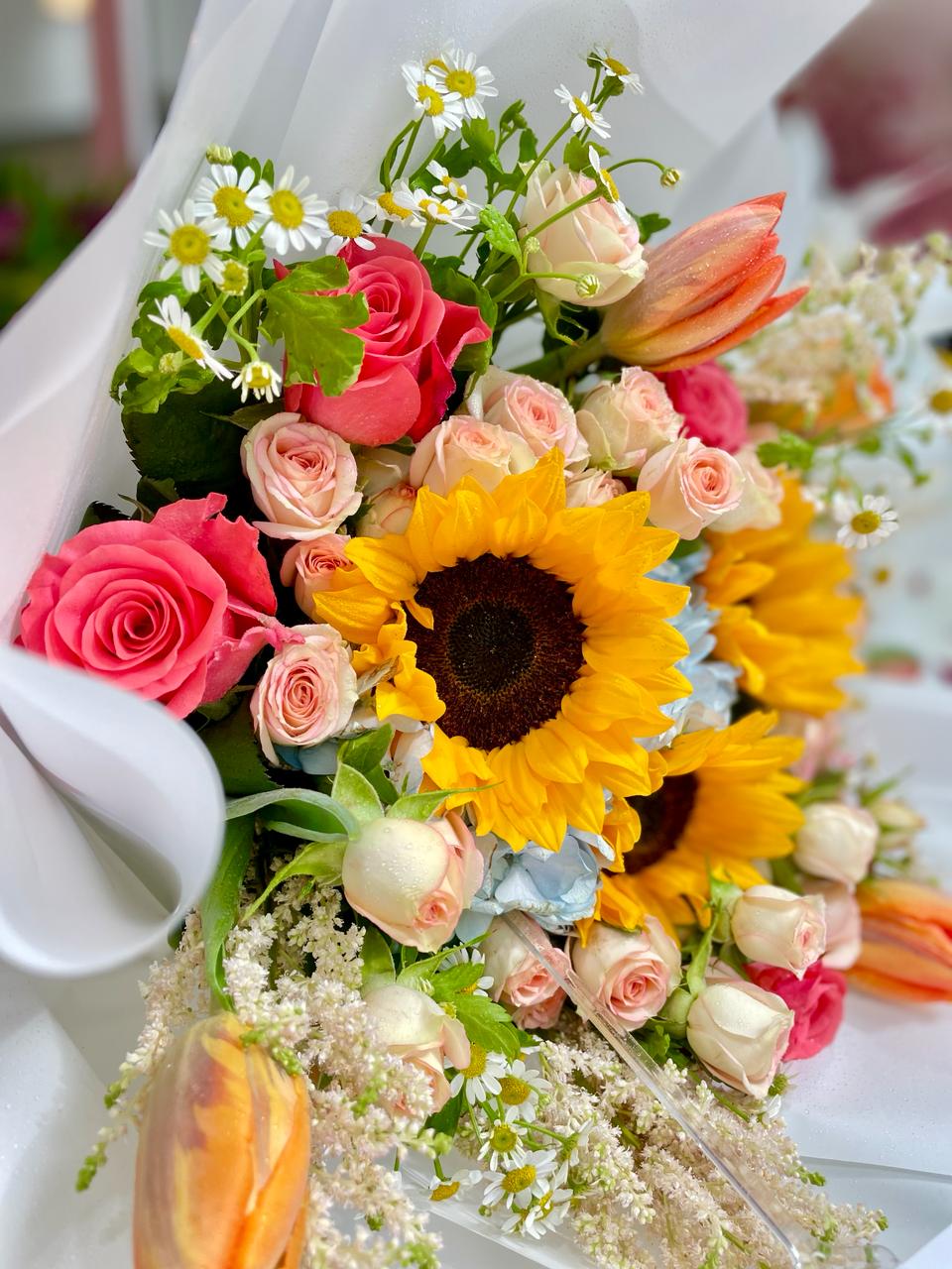 Mixed Flowers, sunflowers, peach roses, blue hydrangea