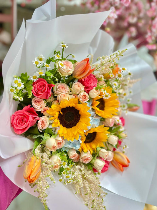 Mixed Flowers, sunflowers, peach roses, blue hydrangea