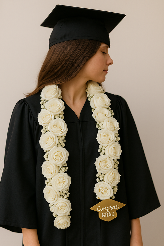 White graduation flower necklace – roses with baby’s breath and custom gold 'Congrats Grad' tag