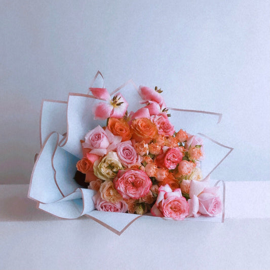 Pink, peach and orange roses
