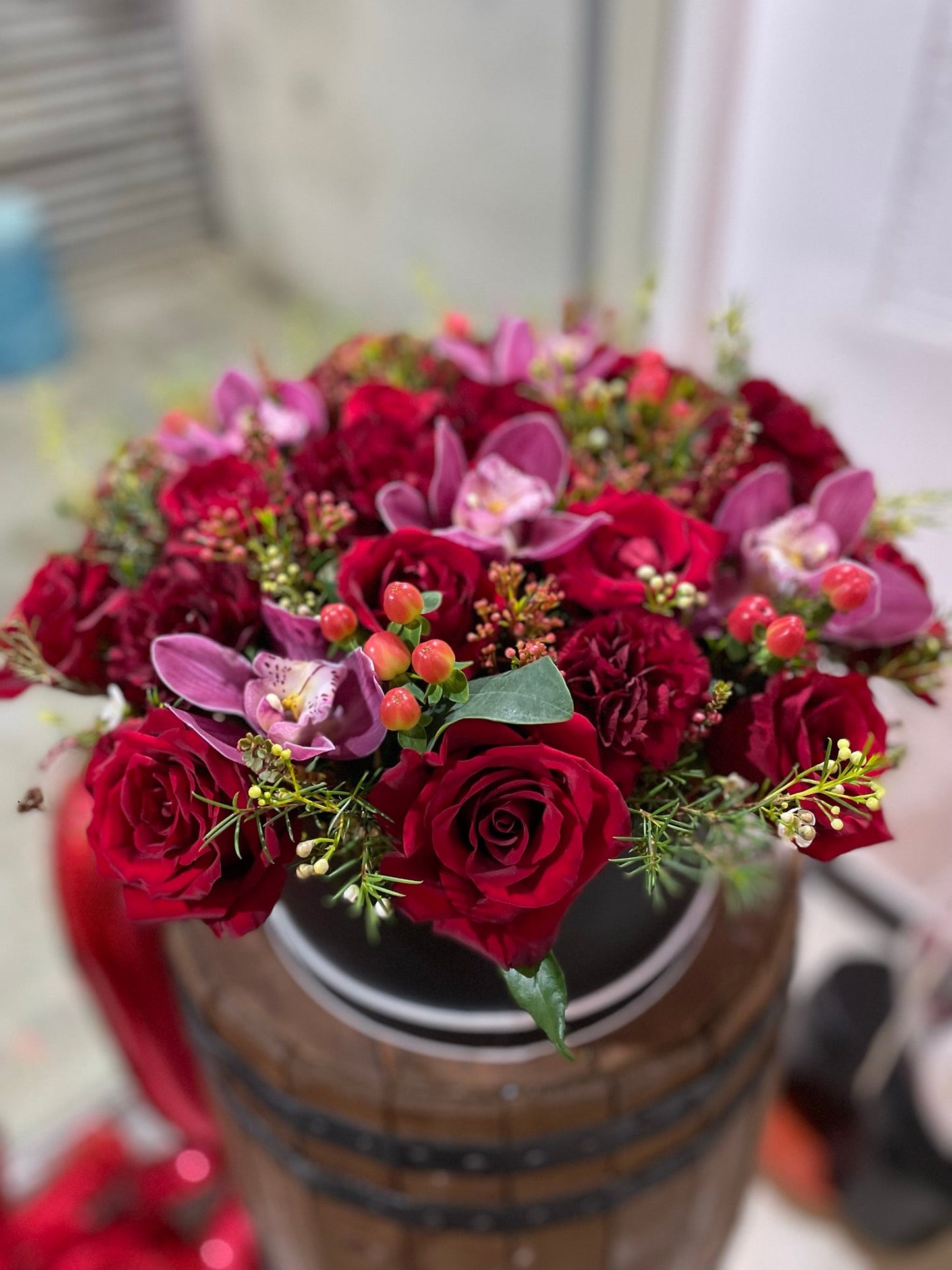 Mixed red flowers with cymbidium