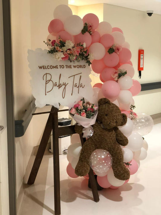 Adorable Baby Girl Sign Board with Balloons and Teddy Bear