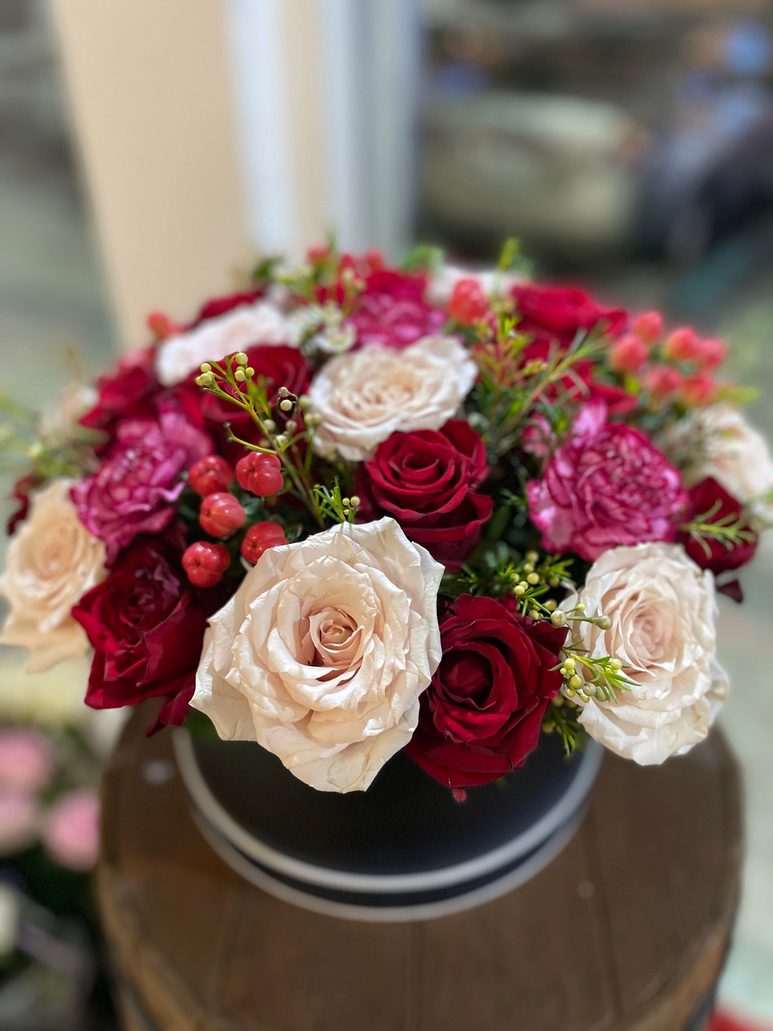 Mixed red and cream roses