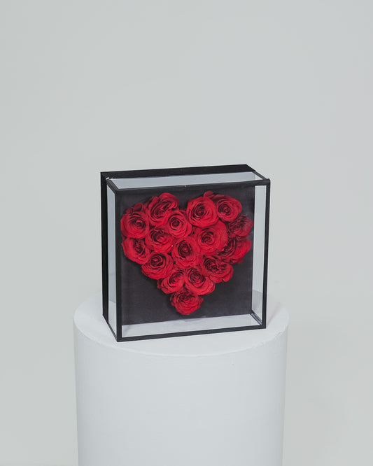 A charming heart-shaped arrangement of roses elegantly presented in a box, a romantic gesture for Valentine's Day.
